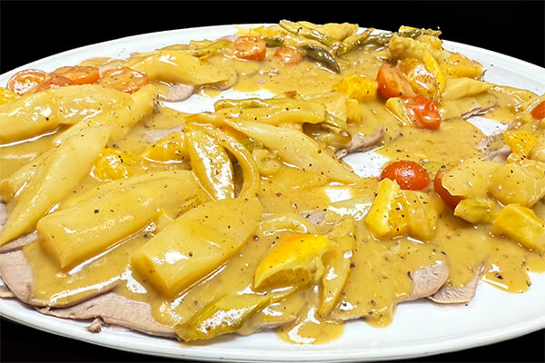 30. Lengua de ternera en salsa de mostaza agridulce.