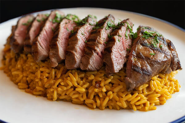 39. Paella de chuletón.